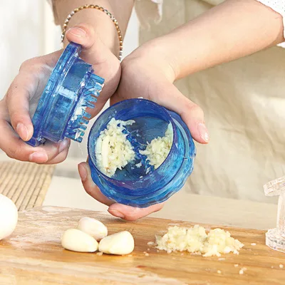 

1PC Kitchen Grinding Mill Ginger Garlic Crusher Creative Multifunction Device Garlic Press Garlic Peeler KX 305