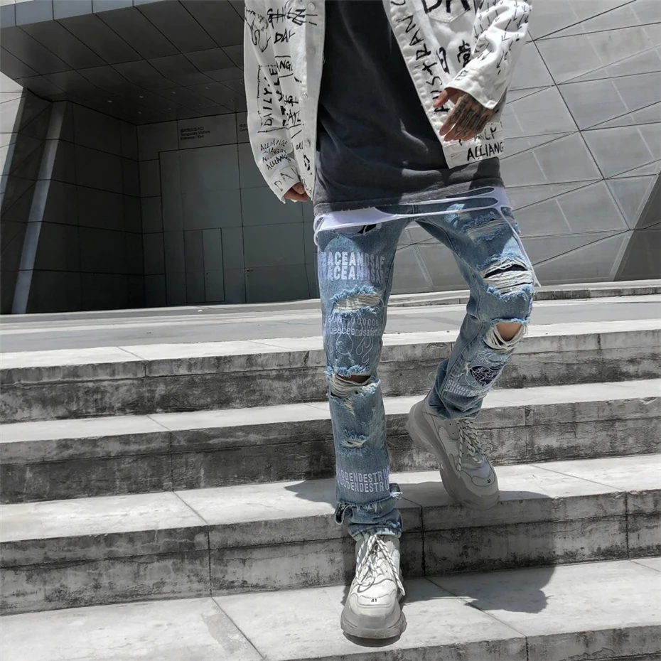 Новые обтягивающие мужские джинсы Уличная рваные джинсы синие Homme хип хоп сломанные граффити печати узкие джинсовые штаны с дырками WG561