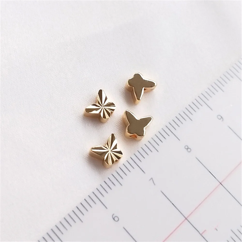 Рисунок 3 - Позолоченные бусины-бабочки 14 к