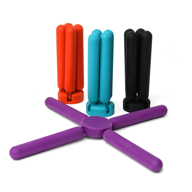 https://ae01.alicdn.com/kf/H01681dc446be4eaab1a52aa2156852e57/4Pcs-Foldable-Silicone-Trivets-Folding-Trivet-Non-Slip-Collapsible-Cross-Compact-Design-Expandable-Silicone-Pot-Holder.jpg