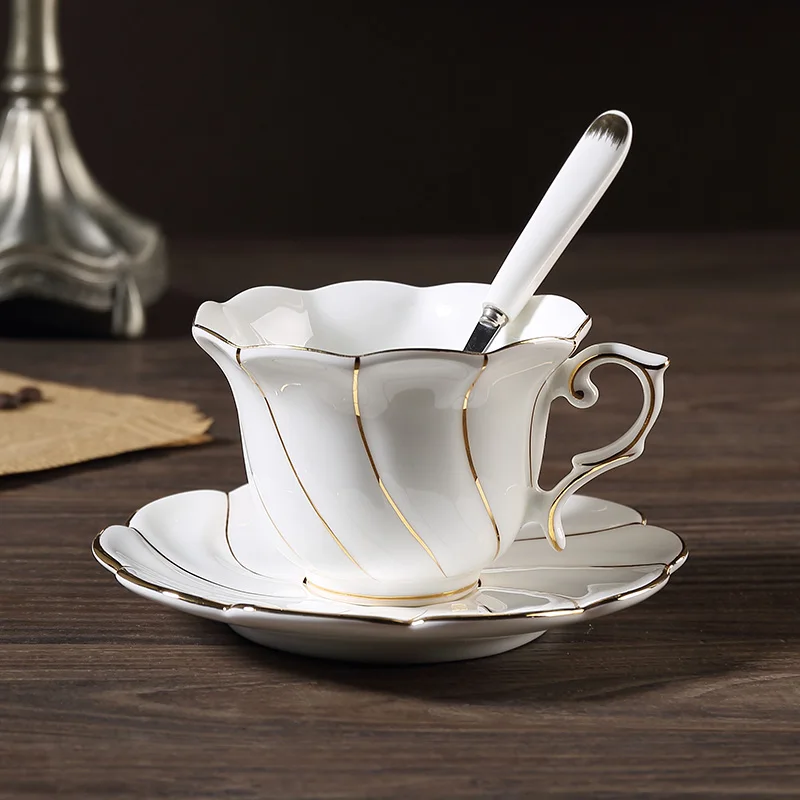 https://ae01.alicdn.com/kf/H016f70c89005473d93fc15f132d3d764E/Gold-Wave-Bone-China-Coffee-Cup-Saucer-Spoon-Set-200ml-Gorgeous-Ceramic-Tea-Cup-High-grade.jpg