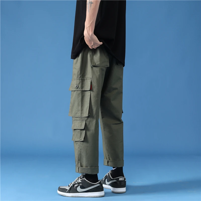 

Multi-pocket tooling men's autumn new style Hong Kong style loose casual couple nine-point trousers