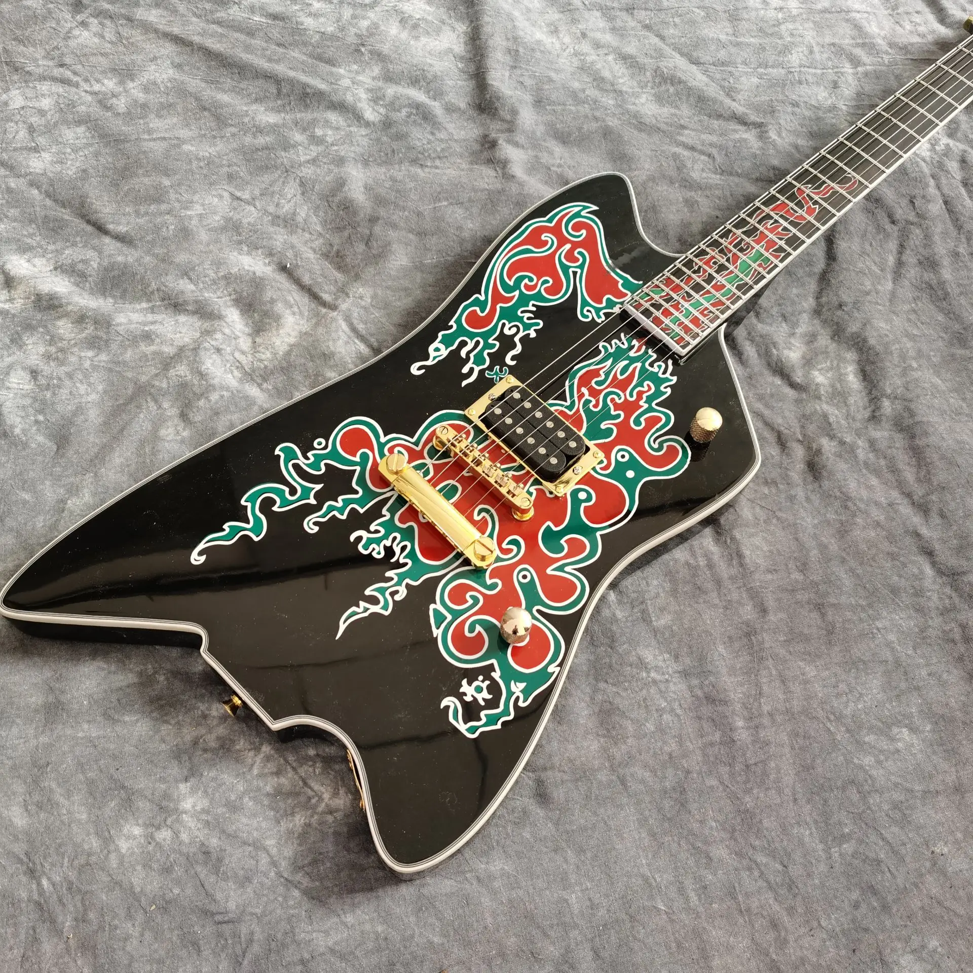 

New style Electric Guitar.handmade 6 stings black color gitaar.high quality pickups.real photos
