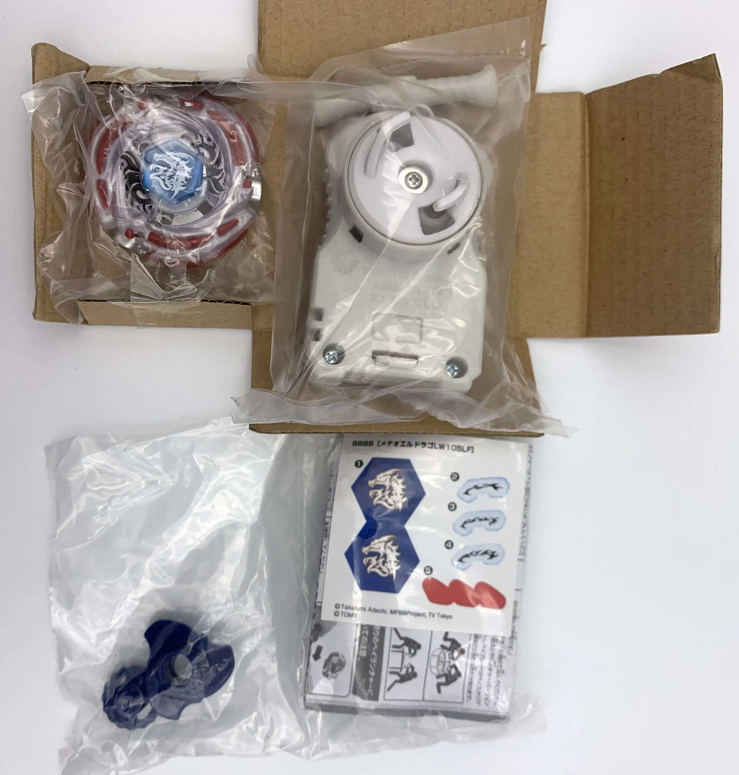 100% оригинал TAKARA TOMY BEYBLADE fusion de metales Meteo L Drago LW105LF + lanzador L|Волчки| |