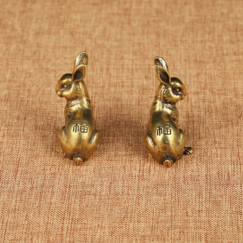 brass rabbit figurines (6)