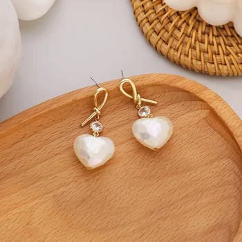

Japanese-style Sweet Elegant Polarized Light Gloss Love 925 Silver Earrings Knot Peach Heart Pearl Pendant Earrings Earrings Ear