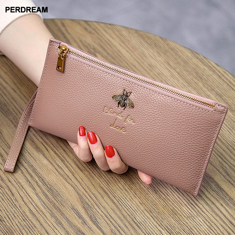 

2019 new European and American leather wallet female long section ultra-thin zipper wallet hand wrist band mobile phone bag tide