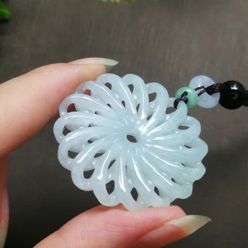 

Natural A yu hand-carved yu Blossoming Hollow yu pendant yu necklace