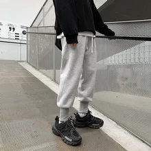 Sweatpants Men’s Fashion Solid Color Drawstring Casual Joggers Pants Men Streetwear Wild Loose Hip Hop Trousers Mens Track Pants