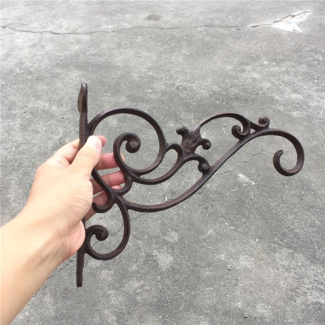 Cast-Iron Bird Plant Hanger  Plant hanger, Wrought iron hooks, Iron decor