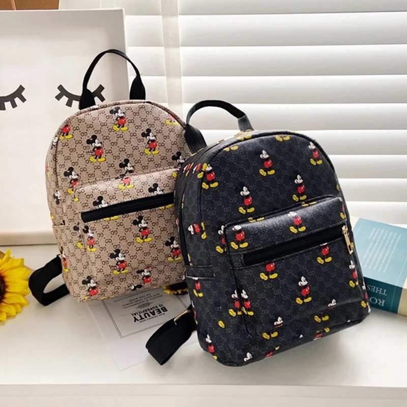 Mochila de PU impermeable con dibujos animados de Mickey para mujer, morral informal para adolescentes, mochila escolar de media capacidad, novedad de 2020