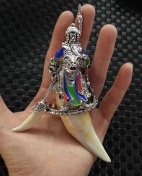 

Chinese Antique Tibetan silver Guan Gong pan long Tiger tooth pendant