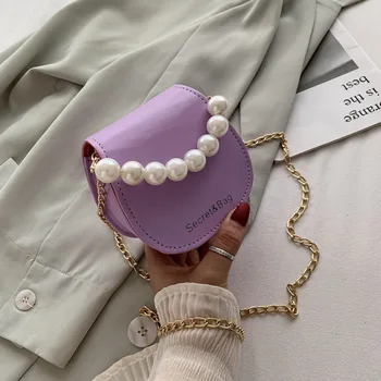 

Mini bag female new spring and summer Korean version of the wild pearl messenger bag Western style single shoulder chain saddle