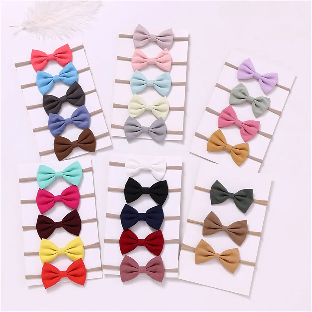 

27pcs/lot New Bow Nylon Headbands soft Hair Bands Newborn Girls Headwear Cute Bow Traceless Headband Hair Accessories Wholesale