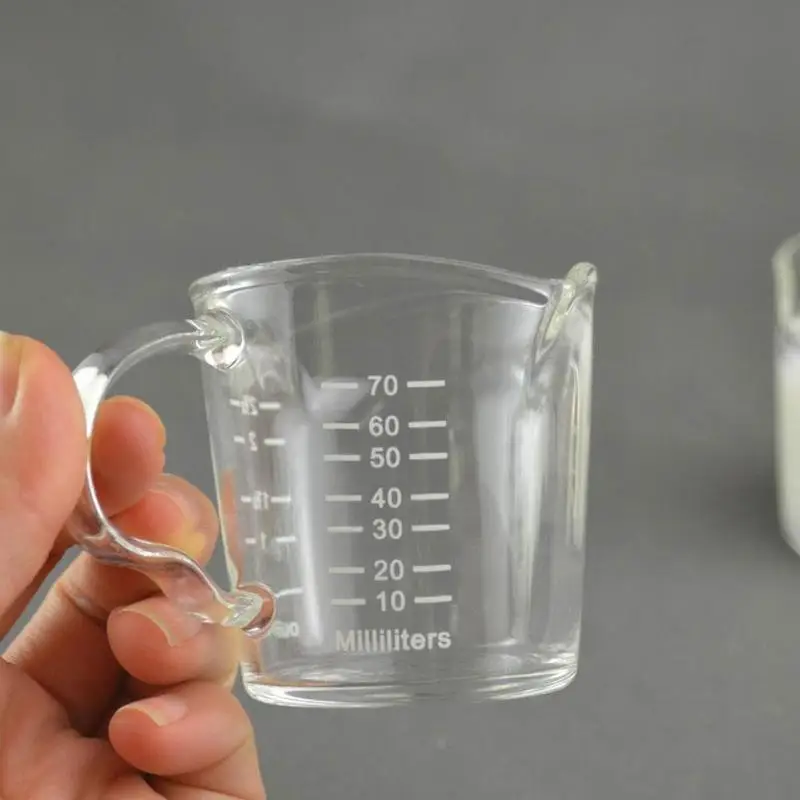 https://ae01.alicdn.com/kf/H0281d2a006454d51b57d42b5cc071c55x/70ml-Heat-resistant-Glass-Measuring-Cup-Small-Milk-Cup-Kitchen-Jigger-for-Espresso-Coffee-Double-mouthed.jpg