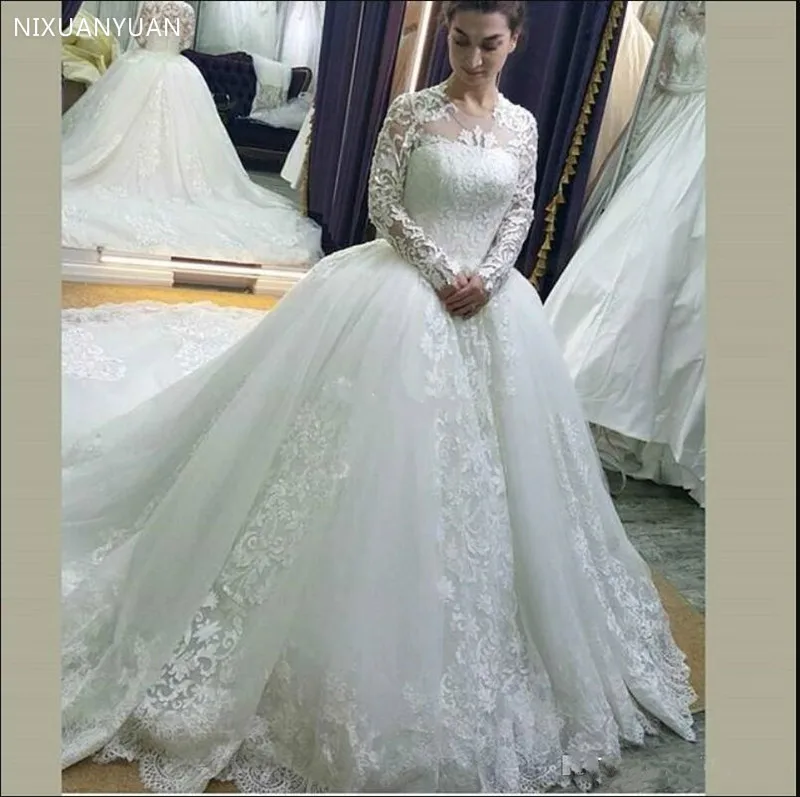 High Quality Tulle Lace Ball Gowns for Church Wedding Full Sleeves Jewel Neck Customized Bridal Gowns Covered with Buttons Back