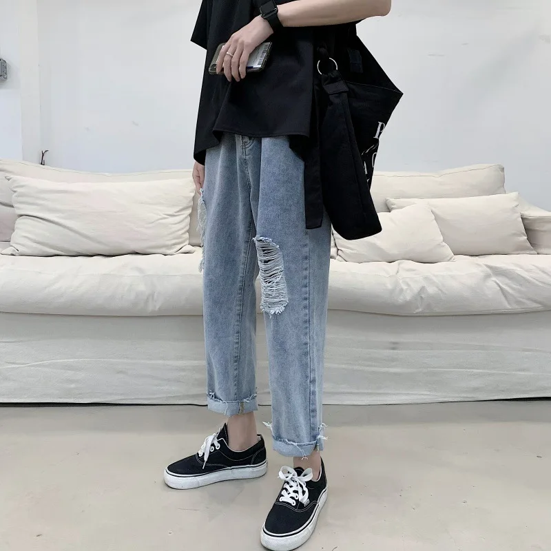 Ripped jeans men's straight loose-fitting trend Korean version of the summer thin nine-point wide-legged pants.