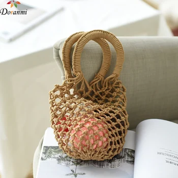 

DORANMI Hollow Out Knitted Bucket Handbag Women's Bags 2020 Summer Beach Web Bags Female Round Handle Handbags Bolsos Mujer G431