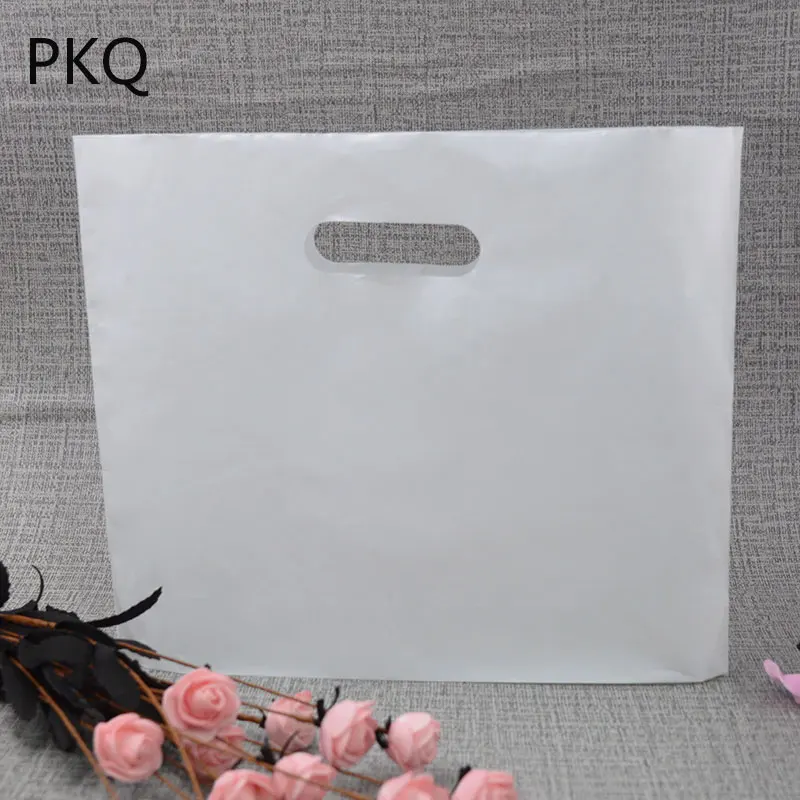 

100pcs large Plastic Gift Bags With Handles small Bags For Shops Jewelry Candy Bags Wedding Favors Birthday Party Decoration bag