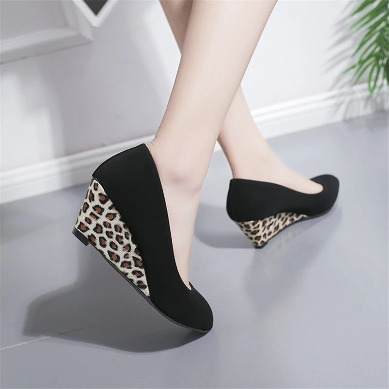 black suede pumps round toe