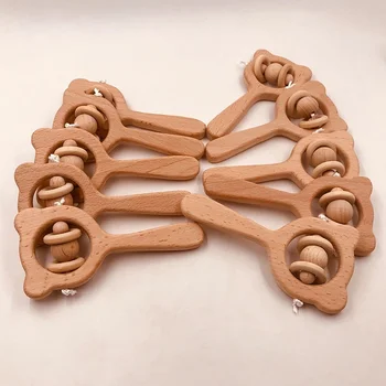 

50pcs Wooden Rattle Beech Bear Hand Teething Wood Ring Baby Rattles Play Gym Montessori Stroller Toy Educational Toys teether
