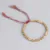 Bracelet Tibétain Tressé Porte-bonheur - Perles Cuivre, Alliage Doré, Unisexe