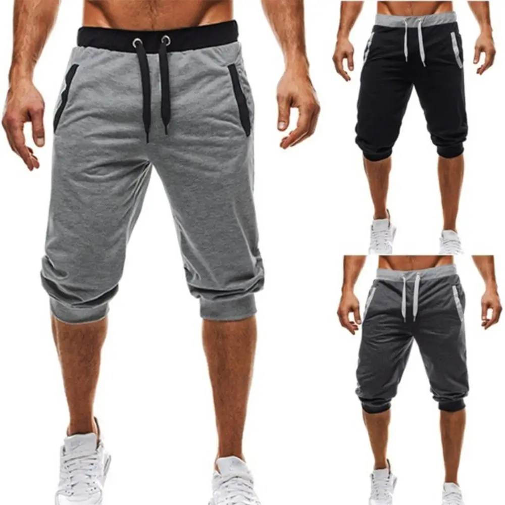 Slim de los hombres de moda Cinco Pantalones cordón elástico Casual al aire libre Fitness deportes transpirable pantalones piratas tamaño M-3XL