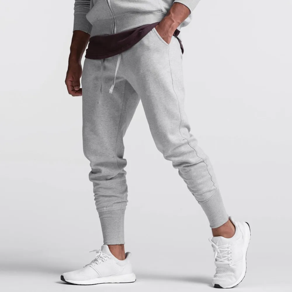 

New Solid Joggers Sweatpants Men Autumn Casual Pencil Pants Gym Fitness Cotton Trousers Male Running Sports Training Trackpants