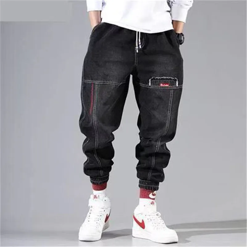 Men's elastic loose fit jeans new black denim overalls men's sports beam feet harem pants trend men's feet pants high elasticity