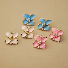 European and American Style Four Petal Flower Flashing Diamond Earrings Temperament Dripping Four Petal Grass Earrings Earrings
