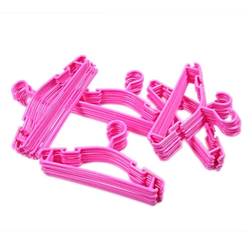 

Pink color Set of 50 Pieces Hangers for baby and child in plastic Durable Plastic Hangers hook for girl or boy 27 x 15 cm