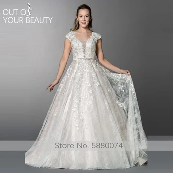 شراءفستان الزفاف الفاخرة Ball-Gown2020 جديد الخامس الرقبة الشمبانيا الصناعة الثقيلة لصائق التطريز 100 سنتيمتر الذيل مغطاة زر أكمام