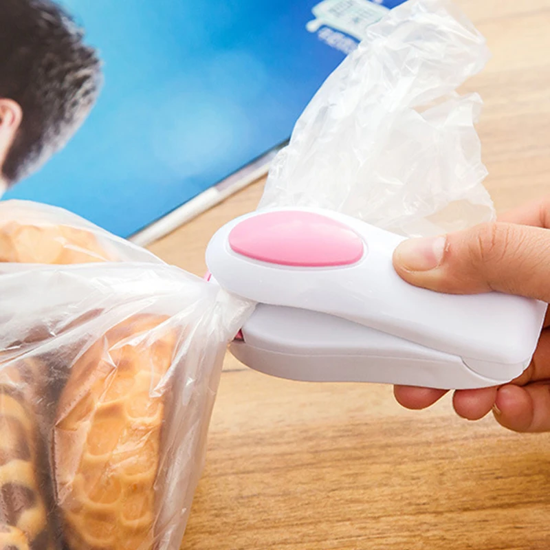 

Mini Handle Bag Sealer Household Food Bag Heat Portable Snack Plastic Bag Sealing Machine Easy Convenient Brand New Kitchen Tool
