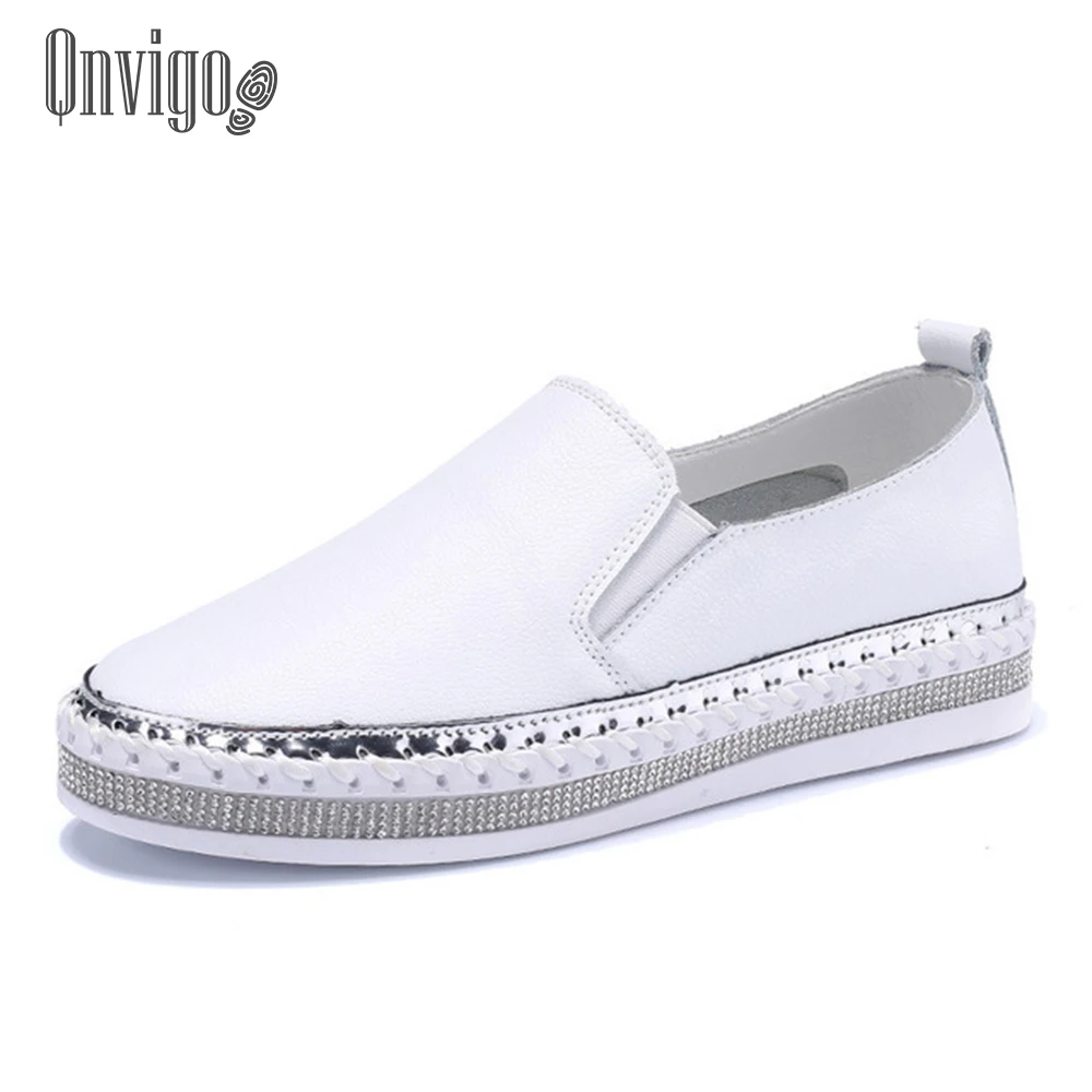 black leather flat pumps