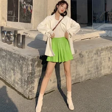 Модные женские юбки из искусственной кожи ярких цветов в Корейском стиле, плиссированные короткие юбки с высокой талией, модные повседневные юбки из искусственной кожи