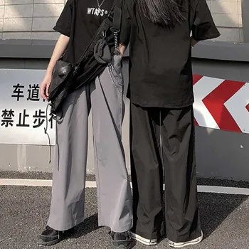 

2019 New women fashion personality youth loose and comfortable Canister and broad-leg trousers Hair Stylist lie fallow trousers