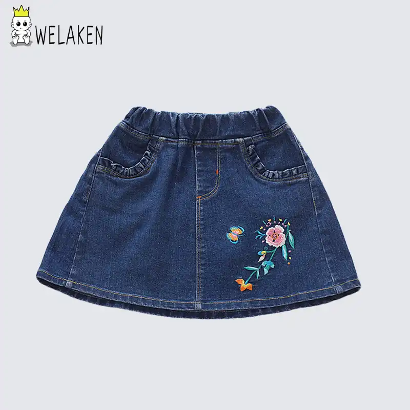 denim skirt with embroidered flowers