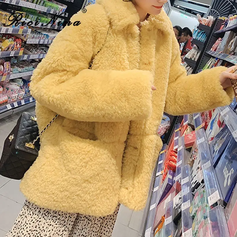 

RICININA Winter Teddy Coat Women Faux Fur Coat Long Sleeve Lapel Solid Pocket Warm Fur Jacket Female 2019 Casual Outwear