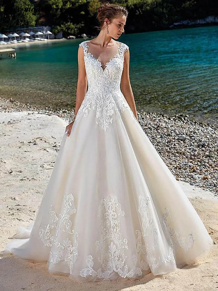 

Beach Boho Wedding Gown 2020 Sleeveless Sheer Neck Appliques Buttons Back Sweep Train A Line Bride Dress Vestidos De Noiva