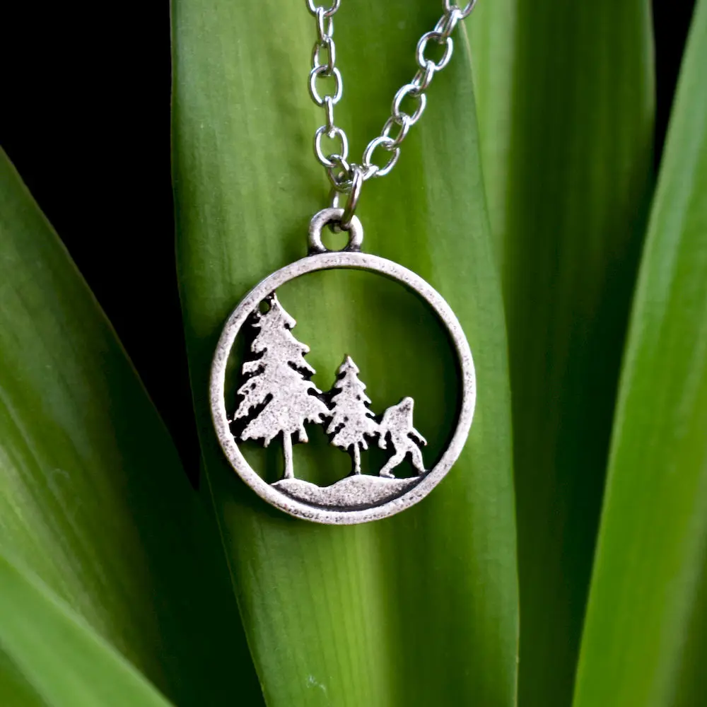SanLan 10pcs Sasquatch Bigfoot necklace under the pine tree jewelry hiking outdoor gift
