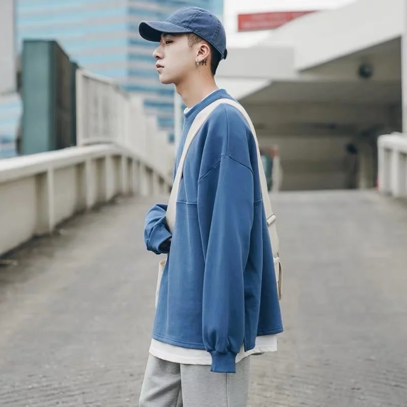 

Spring and Autumn Winter Korean version of the pure color tide men's sweater fake two thin section youth sports ulzzang lovers