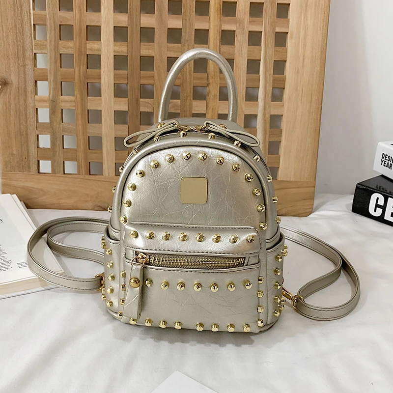 Silver Модные женские маленькие рюкзаки из искусственной кожи с заклепками, однотонные мягкие дорожные сумки на молнии, Mochila Feminina, школьные сумки для девочек-подростков - Цвет: Silver