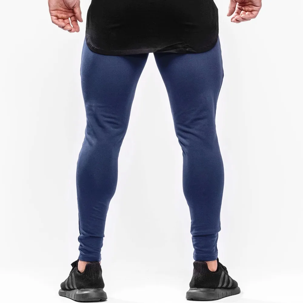 Черные обтягивающие штаны для бега мужские спортивные занятий фитнесом