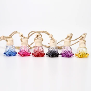 

Car Hanging Perfume Bottle Car Air Freshener Glass Bottle Hanging Perfume pendant For Essentialoils Car-Styling Mirror Ornament