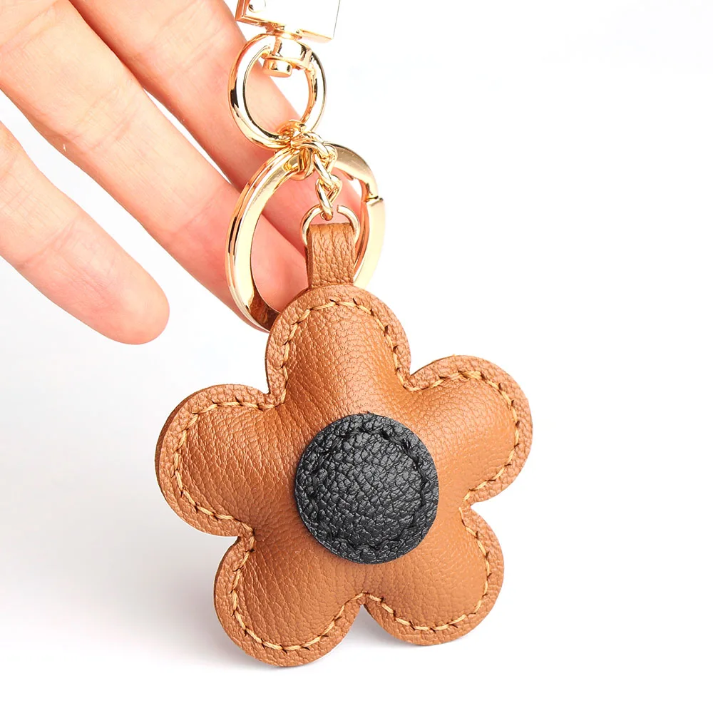 

Luxury Flower Genuine Natural Leather Clover Keychain Ladies Backpack Pendant Women Bag Charm Decorations For Bags