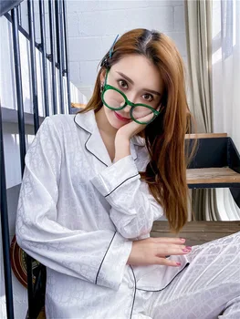 

Silk pajamas female spring and summer two-piece suit Europe and America big-name long-sleeved ice and snow silk red pajamas fema