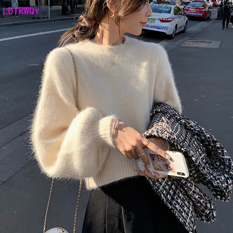 

2019 autumn and winter new women's net red fashion round neck lantern long sleeve loose solid color temperament short sweater