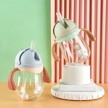 

New Baby Learning Drinking Water Bottles Feeding Sippy Cups With Handles Newborns Kids Cartoon Leakproof Cups
