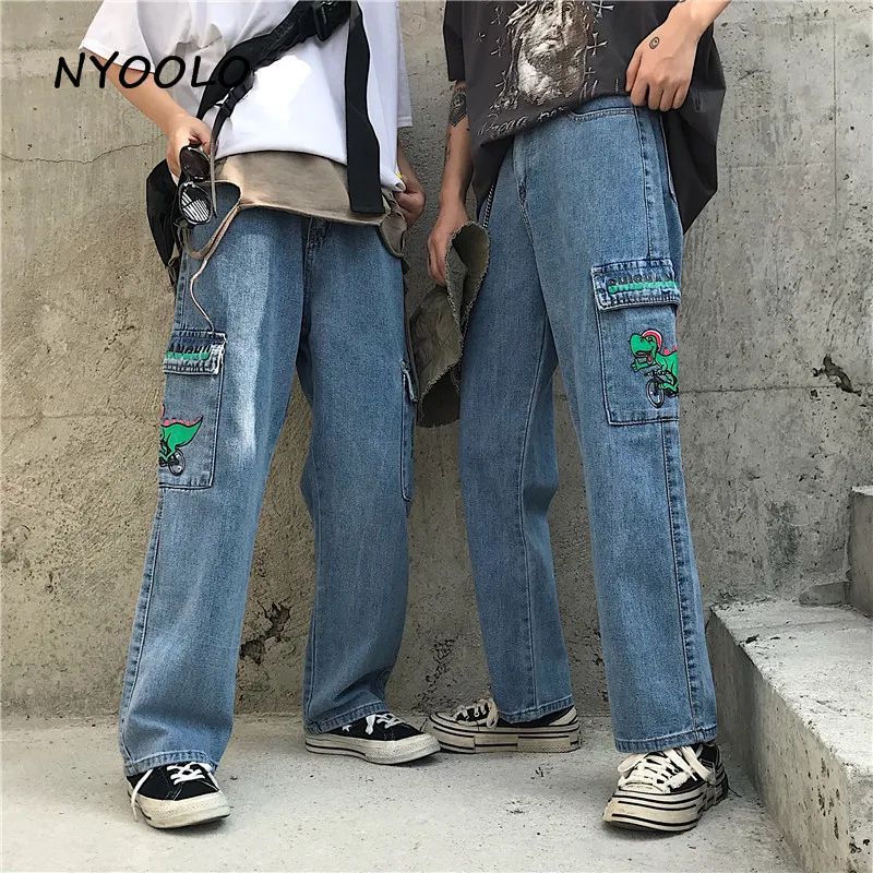 

NYOOLO Harajuku streetwear cartoon dinosaur print big pockets washed jeans Autumn full length straight denim pants women men