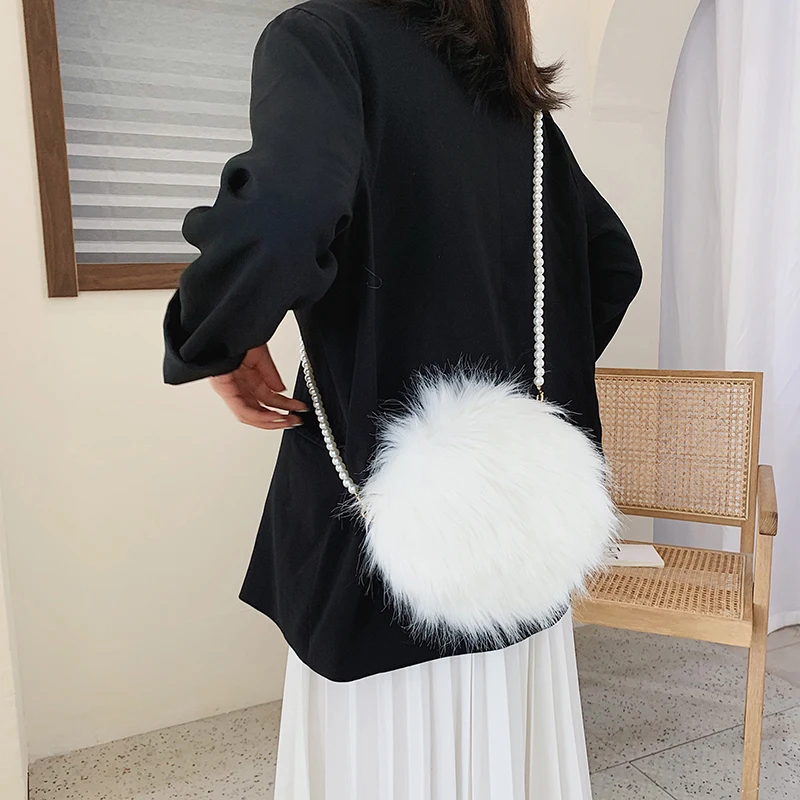 white fur purse
